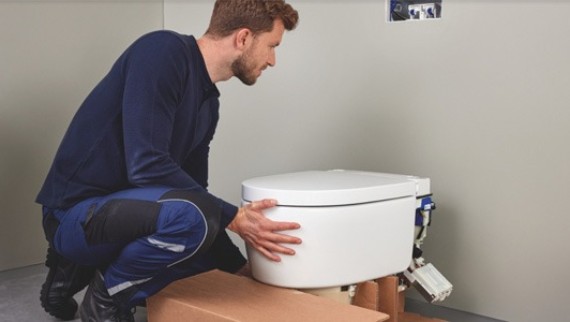 Pesu-wc:n asennus ja seinä-wc:n sähköistys